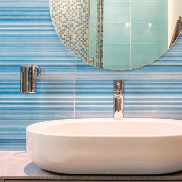 Two sinks and mirrors Two sinks and mirrors in a blue bathroom